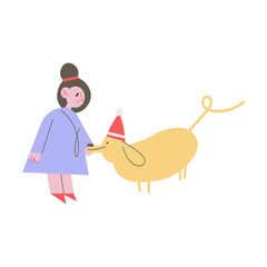 Happy small girl walking dog in festive Christmas cap