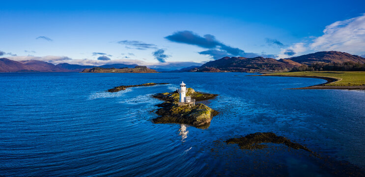 Aerial view of Sager Bhuidhe&nbsp;Lighthouse, loch linnhe and offshore islands on the west coast of the argyll region of the highlands of Scotland during winter