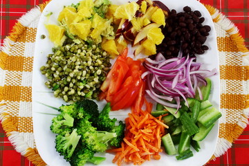 fresh cut various mix vegetable for salad or cooking, top view closeup