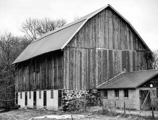 Weathered and old Agricultural farm building in the winter