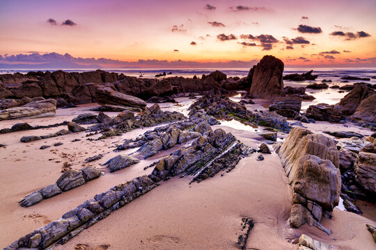 Barrika wild beach at sunset, Biscay, Basque Country, Spain.