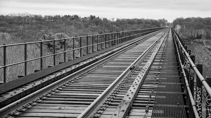Fototapeta na wymiar Empty vintage railway bridge in the country