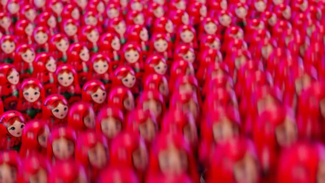 Beautiful handmade matryoshka dolls. A huge number of Babushkas jumping together