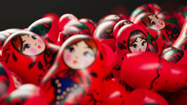 Beautiful handmade matryoshka dolls. A huge number of Babushkas create a stack.