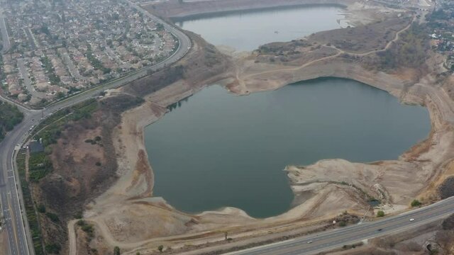 Aerial shot of Blue / Green Lake in city
