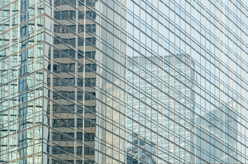 Structural modern glass windows in building walls
Futuristic reflective façade found in modern buildings
