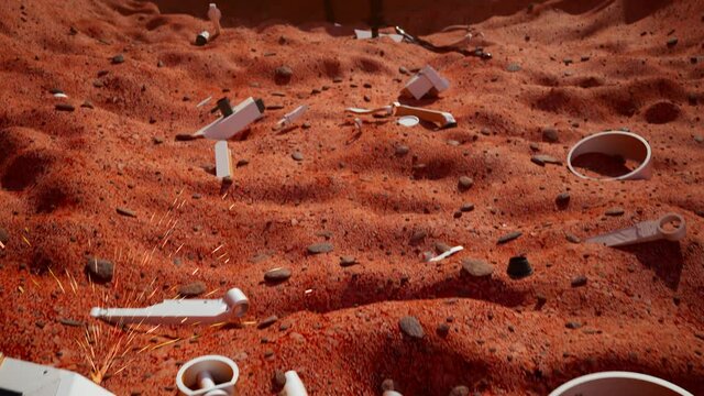 Splashed down spaceship and scattered parts of a planetary rover. Smashed UFO.