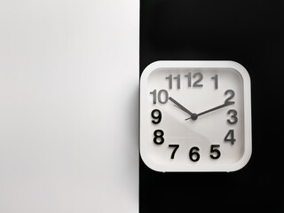 Top view image of square alarm clock isolated on white and black background. 