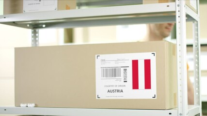 Box with goods from Austria in a warehouse - Powered by Adobe