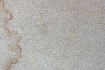 Macro photo of an old and stained piece of paper