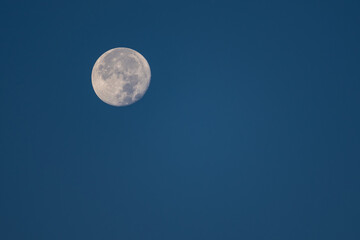 Naklejka na ściany i meble Bright Moon on Blue Sky