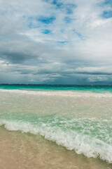 Fototapeta na wymiar ocean waves breaking on the beaches of the Mexican Caribbean Sea