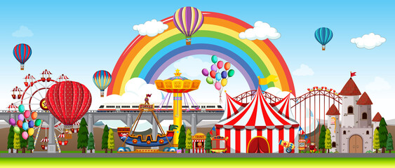Amusement park scene at daytime with balloons and rainbow in the sky