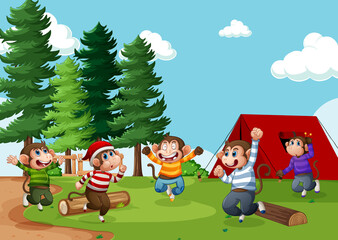 Obraz na płótnie Canvas Five little monkey jumping in the park scene