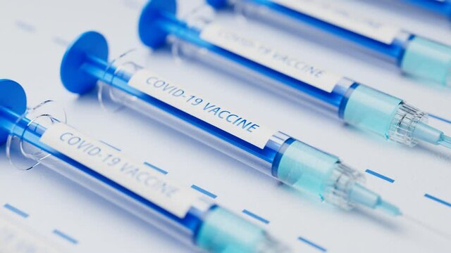 Syringes with a cure ready to inject. Covid vaccine. Vaccination. Inoculation.
