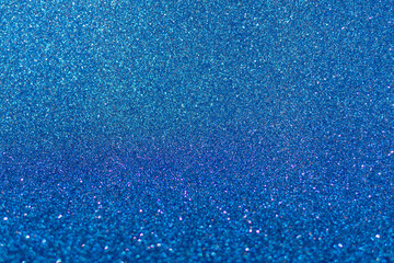 Shiny blue glitter texture background stock images. Texture of blue glitter shiny background. Abstract blue shiny background with copy space for text.