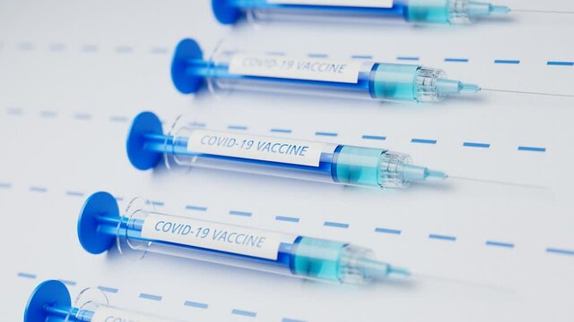 Syringes with a cure ready to inject. Covid vaccine. Vaccination. Inoculation.