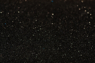 Shiny black glitter texture background stock images. Texture of black glitter shiny background. Abstract black shiny background with copy space for text.