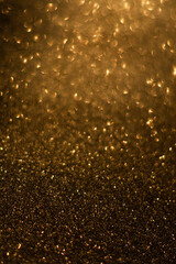 Shiny gold glitter texture background stock images. Texture of gold glitter shiny background. Abstract gold shiny background with copy space for text.