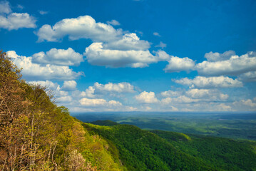 Naklejka na ściany i meble A beautiful blue sky and white clouds from the top of Whiteside's mountain, North Carolina, USA.