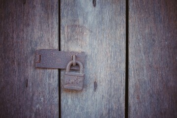 Old brown wooden door vintage style image for abstract wood texture background.