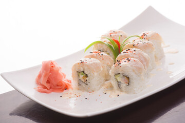 A table of sushi rolls