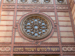 close up the front exterior window of the great synagogue in budapest, hungary
