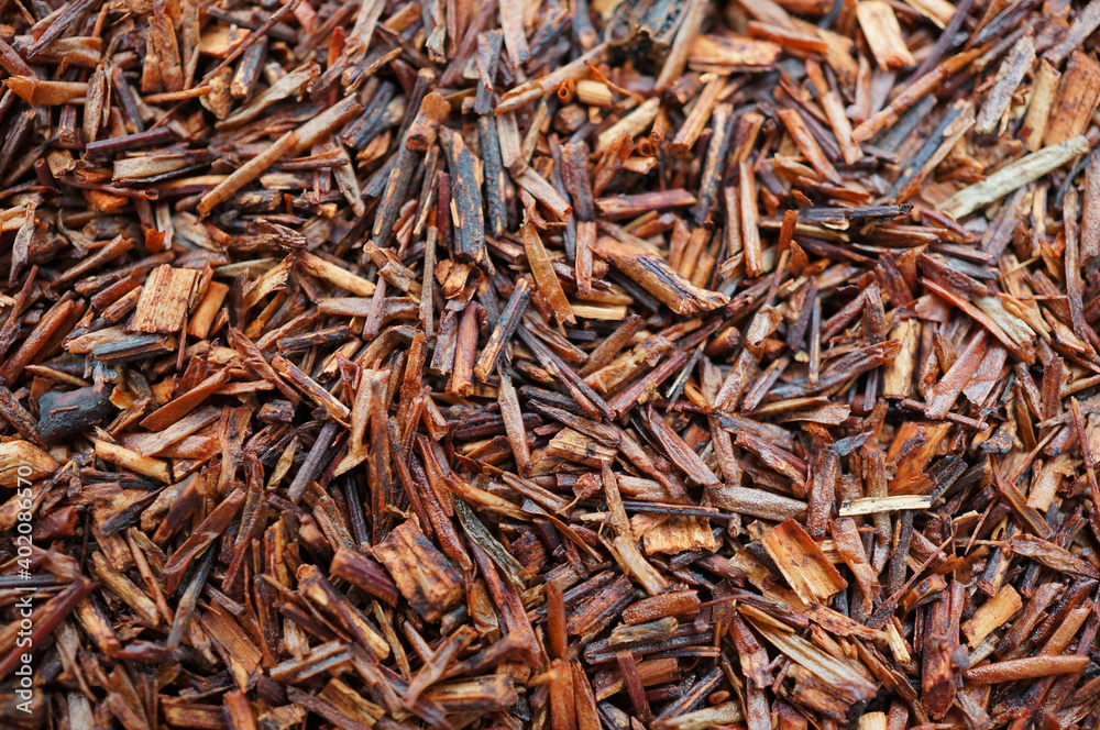 Canvas Prints A top view closeup of African rooibos tea leaves piled up on each other