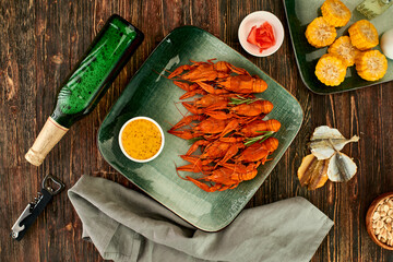 Crayfish-boiled river crayfish on a dark wooden background.Space for text.