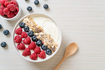 homemade yogurt bowl with raspberry, blueberry and granola