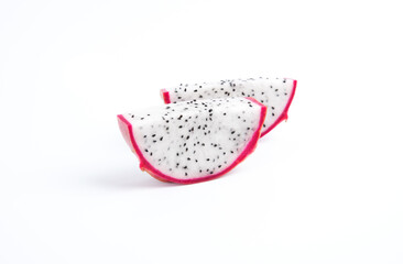 Two slices of dragon fruit isolated on white background