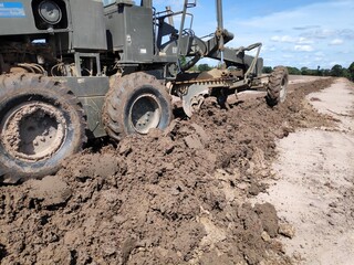 Heavy equipment creates new roads.