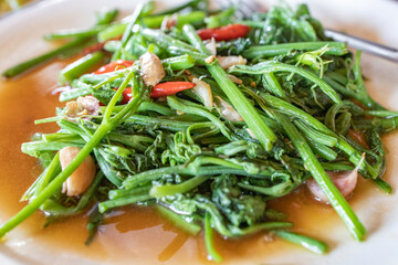 Stirred fried Chaiyote shoot with chilli and garlic