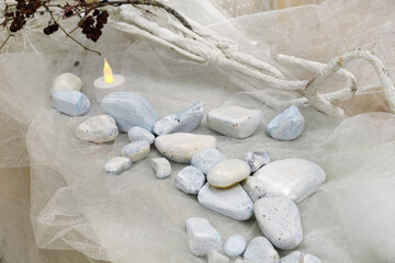 Still life with painted white pebbles