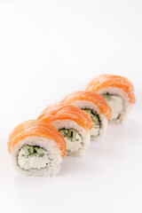 Philadelphia roll sushi on a white plate. Isolated. Restaurant concept. Close-up.
