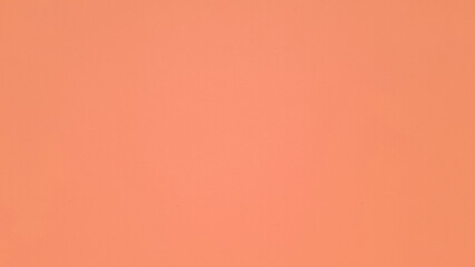 Orange painted wall for background. Colorful of concrete wallpaper.