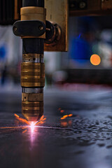 A vertical shot of the professional laser cutter in the factory