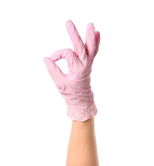 Hand in protective glove showing OK on white background