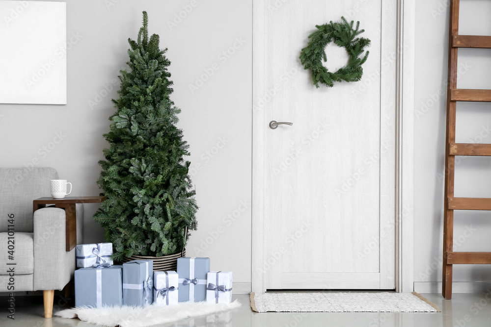 Wall mural Interior of living room with beautiful Christmas tree