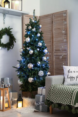 Interior of living room with beautiful Christmas tree