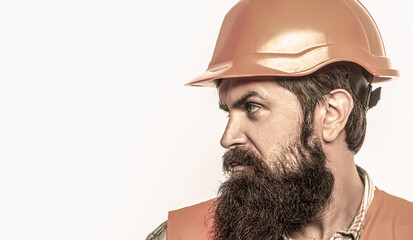 Builder in hard hat, foreman or repairman in the helmet