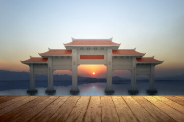 Wooden floor with a Chinese pavilion gate with red roof with lake view