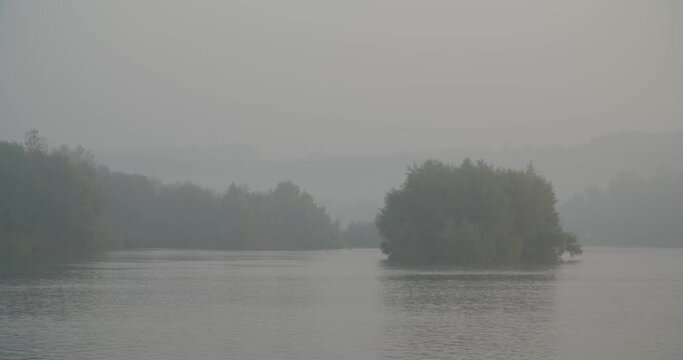 Morning sunrise with a mist on the Drava River