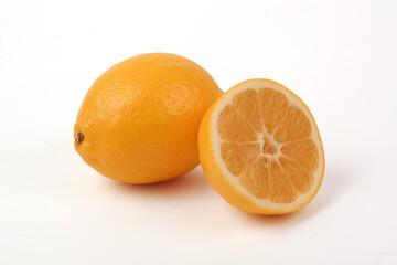 isolated lemons lie on a white background