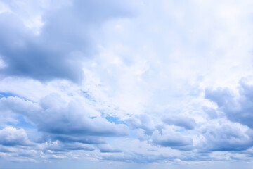 white clouds on blue sky background, abstract seasonal wallpaper, sunny day atmosphere