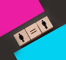 Concepts of gender equality. wooden cubes with female and male symbol and equal sign. Equal pay...