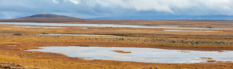 Panoramic landscape in autumn, with small lakes in the central highlands of east Iceland