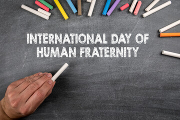 International Day of Human Fraternity, 4 February. Gray chalk board