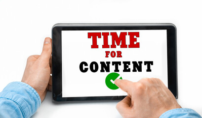 Closeup of a male hands holding tablet pc with text Time For Content