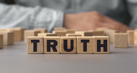 The word Truth made from wooden cubes. Shallow depth of field on the cubes